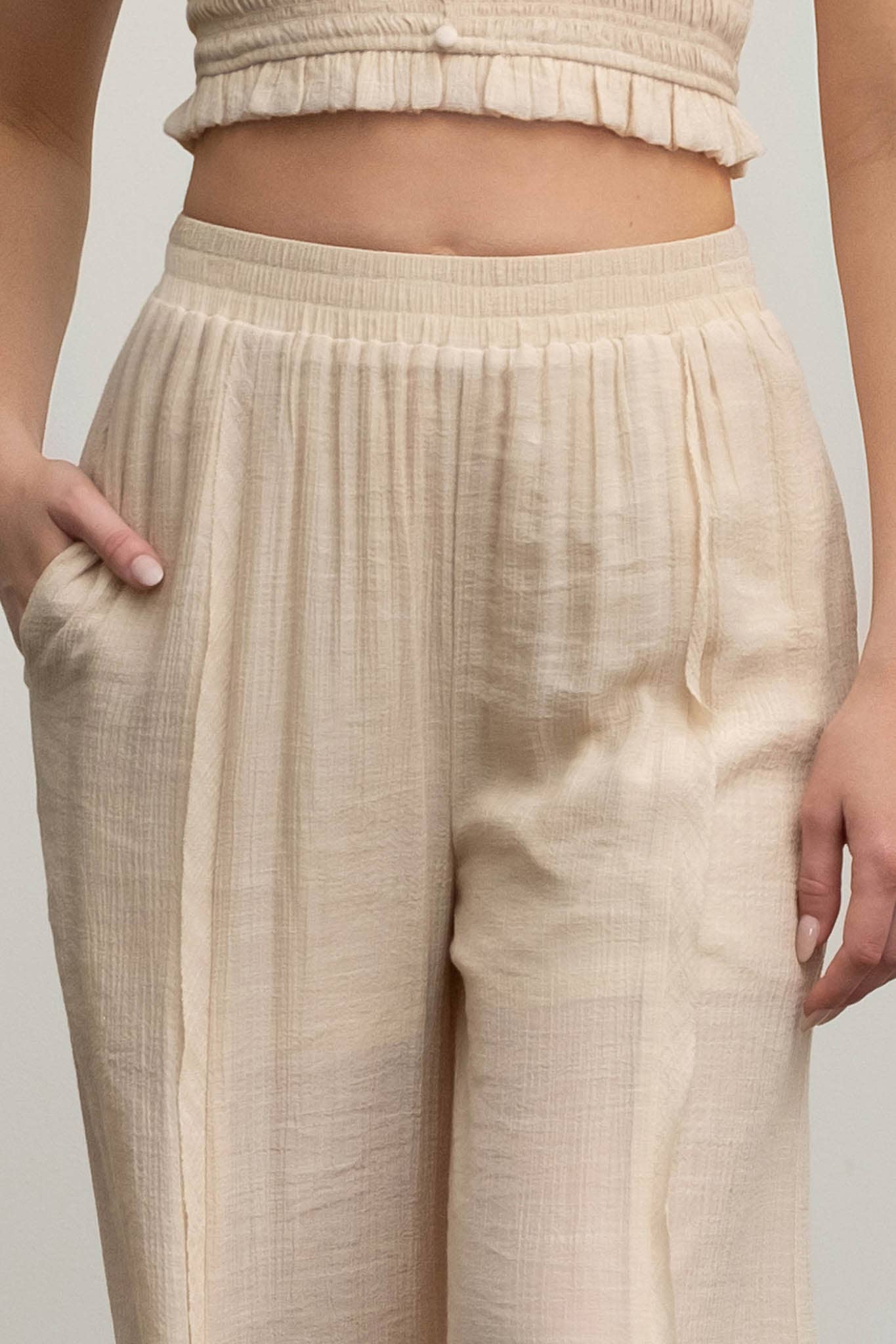 Close Up Front View HIGH WAIST WIDE LEG PINTUCK PANTS: LIGHT TAUPE Blu Pepper 5